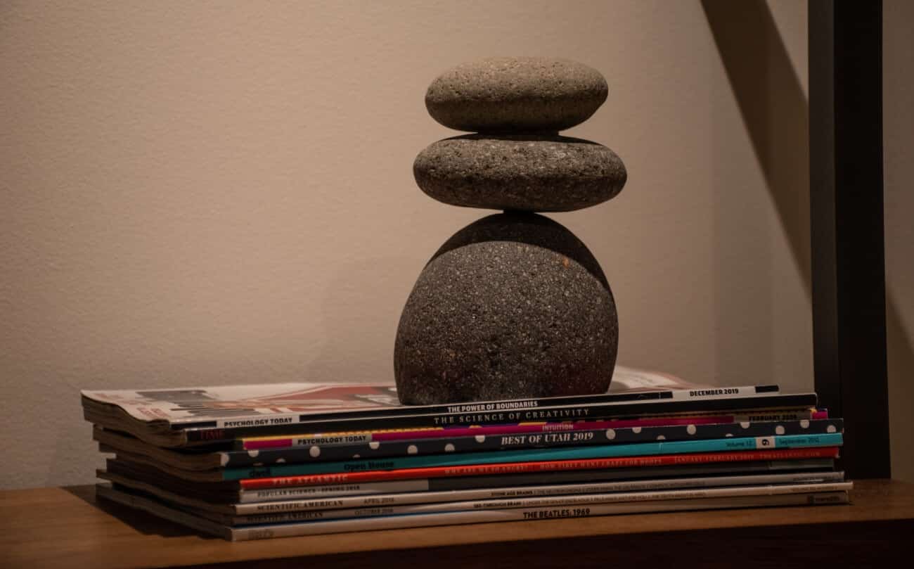 A Karen sculpture on top of a stack of magazines on display at the clinic at K Therapy SLC.