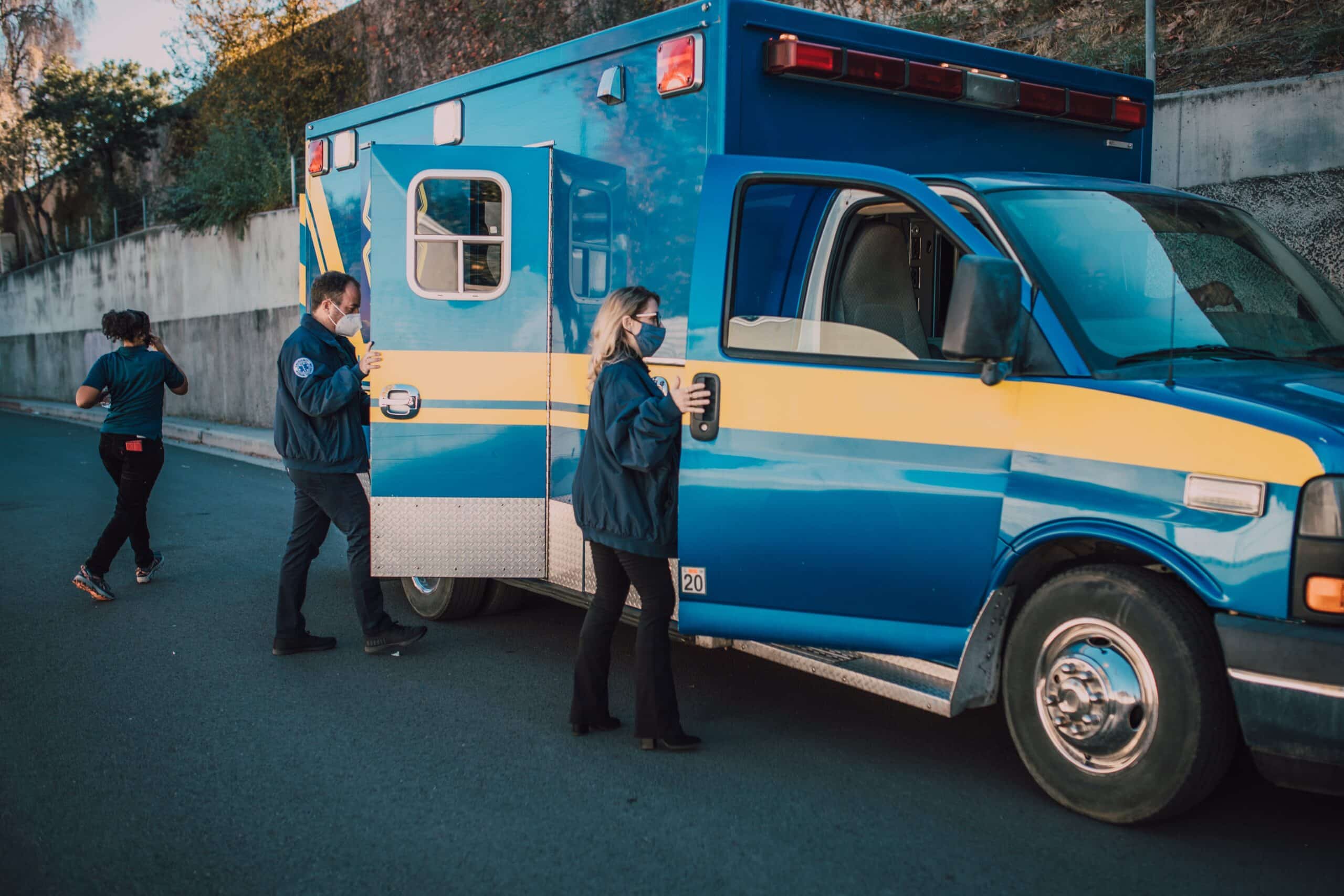 picture of EMT's opening up an ambulance