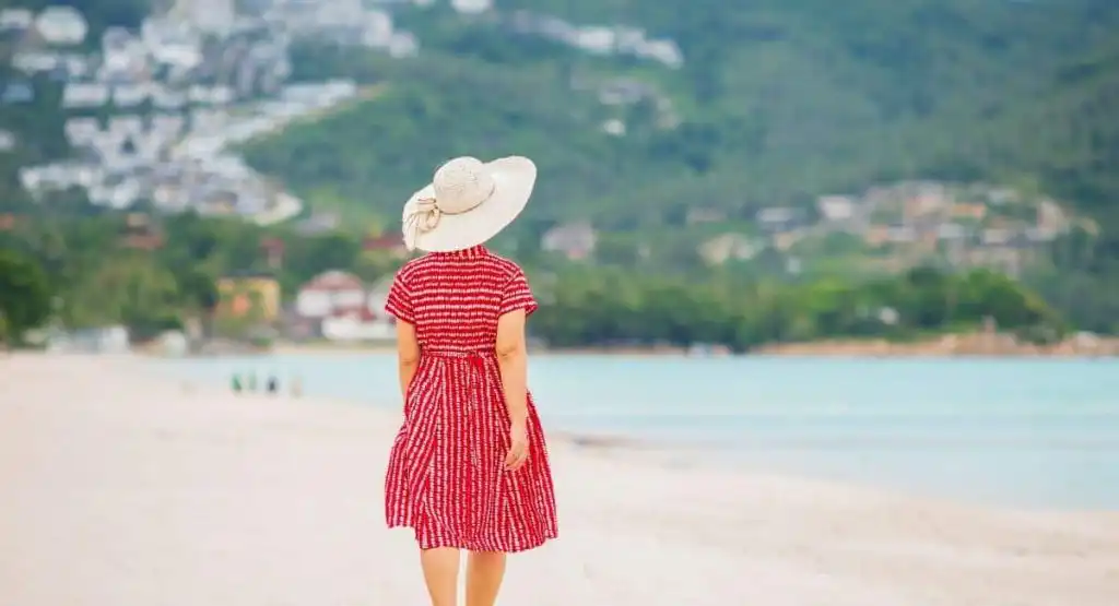 middle aged woman at the beach showcasing Sharon Osbourne and Ketamine Therapy.