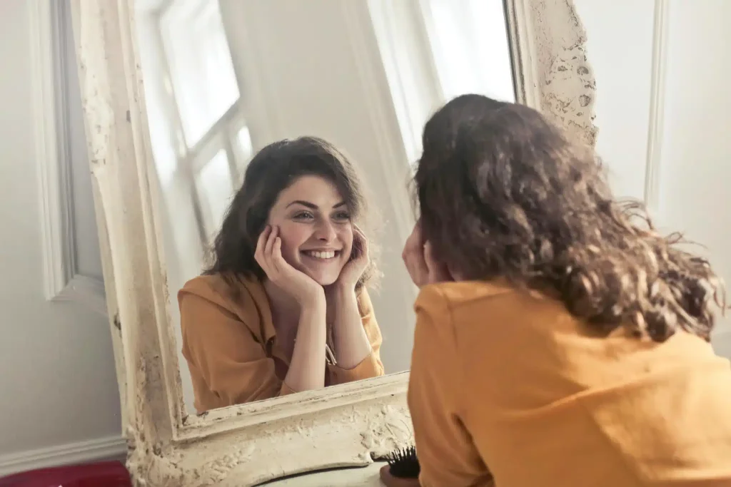 Smiling girl experiencing relief from anxiety and depression after Low-Dose Ketamine Therapy.